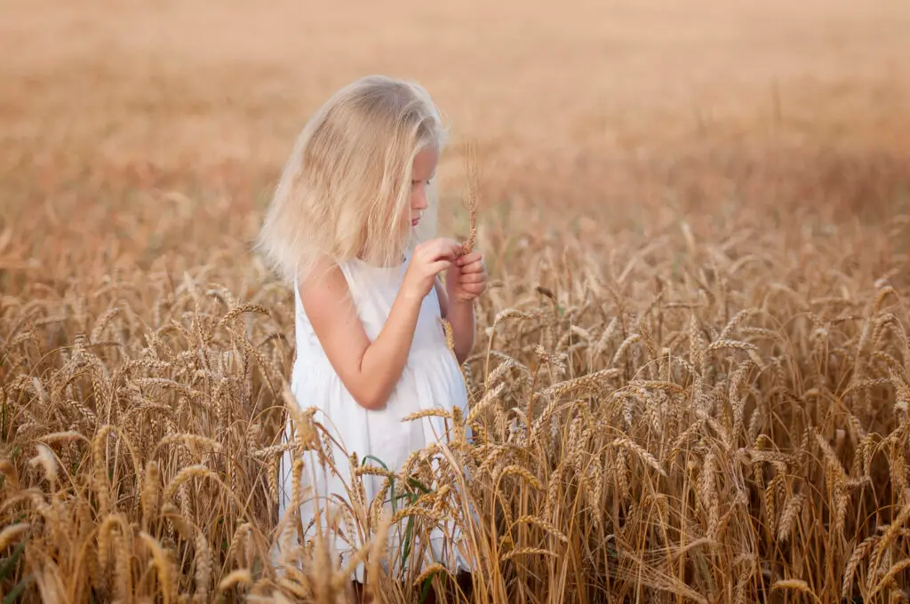little girl in a field